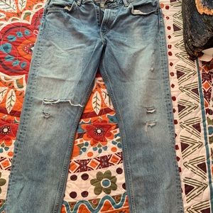 Levi 505c ladies size 32. Distressed.